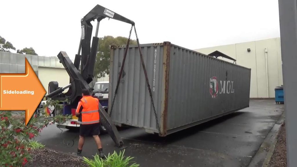 Unload a Container Using a Side Loader Truck